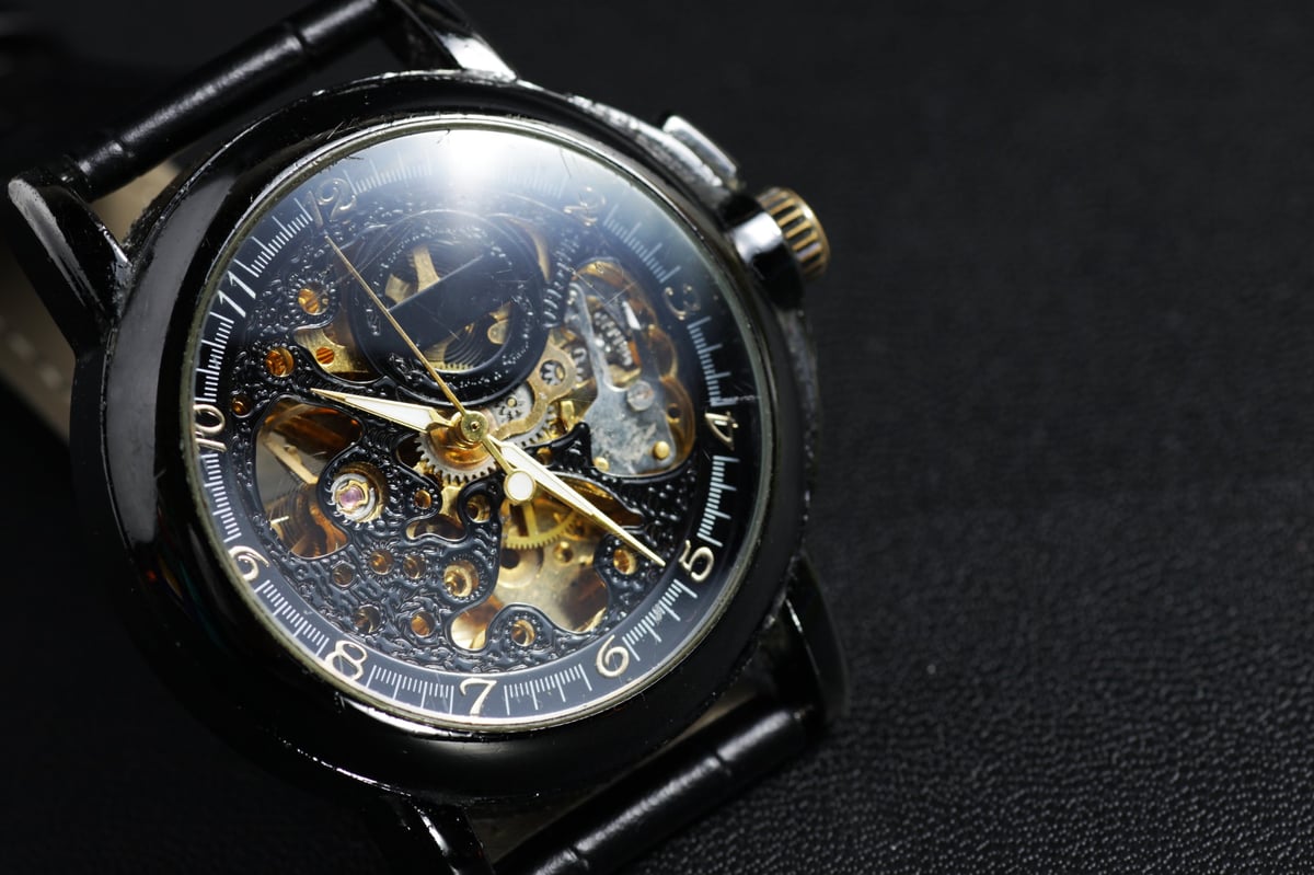 Black automatic self-winding skeleton dial watch